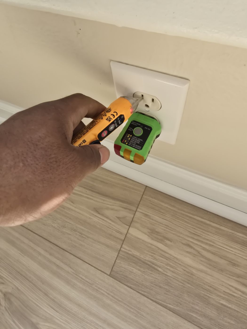 Outlet being tested during an inspection