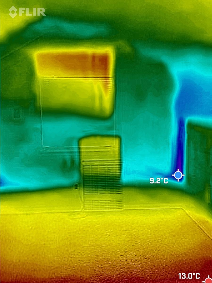 Thermal image of an interior wall showing temperature variation